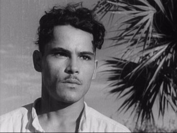 Movie still from “Redes” (1936), directed by Fred Zinnemann – Black and white photograph of a man with a mustache; Close Up shot, Low angle