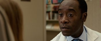 Movie still from “Reign Over Me” (2007), directed by Mike Binder – A person wearing a white shirt; Close Up shot, Low angle