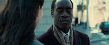 Movie still from “Reign Over Me” (2007), directed by Mike Binder – A man in a brown jacket and a man in a brown jacket; Close Up shot, Over the shoulder angle