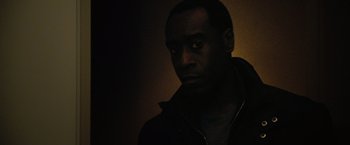Movie still from “Reign Over Me” (2007), directed by Mike Binder – A man in a black jacket is looking at the camera; Close Up shot, Low angle