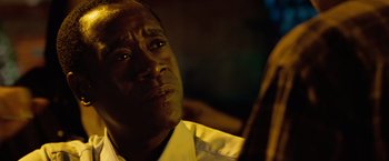 Movie still from “Reign Over Me” (2007), directed by Mike Binder – A person with his eyes wide open; Close Up shot, Over the shoulder angle