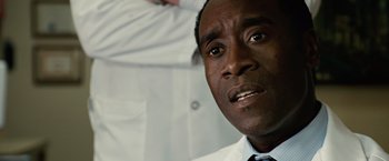 Movie still from “Reign Over Me” (2007), directed by Mike Binder – A person wearing a white shirt and tie; Close Up shot, Low angle