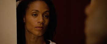 Movie still from “Reign Over Me” (2007), directed by Mike Binder – A person with long black hair; Close Up shot, Over the shoulder angle