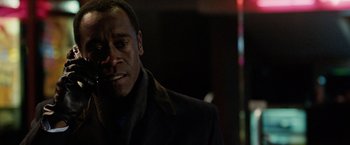 Movie still from “Reign Over Me” (2007), directed by Mike Binder – A man in a black coat and a black jacket; Close Up shot, Over the shoulder angle