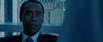 Movie still from “Reign Over Me” (2007), directed by Mike Binder – A person wearing a suit and tie; Close Up shot, Over the shoulder angle