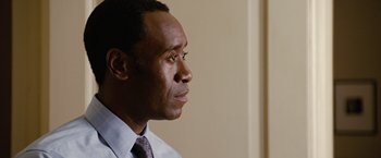 Movie still from “Reign Over Me” (2007), directed by Mike Binder – A person wearing a suit and tie; Close Up shot, Over the shoulder angle