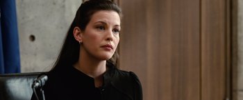 Movie still from “Reign Over Me” (2007), directed by Mike Binder – A beautiful young woman in a black shirt; Close Up shot, Over the shoulder angle