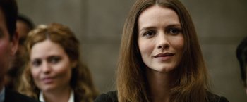 Movie still from “Reign Over Me” (2007), directed by Mike Binder – A person with long brown hair; Close Up shot, Over the shoulder angle