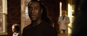 Movie still from “Reign Over Me” (2007), directed by Mike Binder – A person wearing a black shirt; Close Up shot, Over the shoulder angle