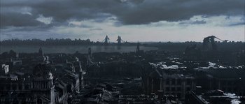 Movie still from “Reign of Fire” (2002), directed by Rob Bowman – An image of a city that has been destroyed; Extreme Wide shot, High angle