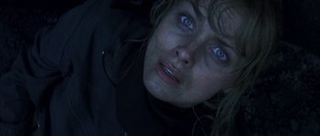 Movie still from “Reign of Fire” (2002), directed by Rob Bowman – A person with blue eyes; Close Up shot, Overhead angle