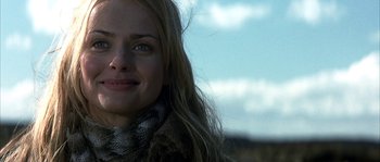 Movie still from “Reign of Fire” (2002), directed by Rob Bowman – A person with long hair; Close Up shot, Low angle