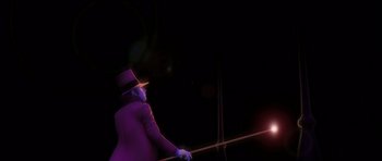 Movie still from “Renaissance” (2006), directed by Christian Volckman – A man in a top hat is holding a stick; Medium shot, Low angle