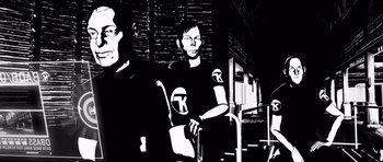 Movie still from “Renaissance” (2006), directed by Christian Volckman – A black - and - white photo of three people sitting on steps; Close Up shot, Low angle