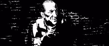 Movie still from “Renaissance” (2006), directed by Christian Volckman – A black - and - white drawing of a man with a beard; Close Up shot, Low angle