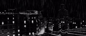 Movie still from “Renaissance” (2006), directed by Christian Volckman – A black - and - white photo of a city at night; Extreme Wide shot, Low angle