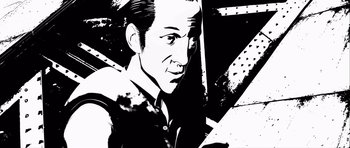 Movie still from “Renaissance” (2006), directed by Christian Volckman – A black and white image of a man in a suit; Close Up shot, Low angle