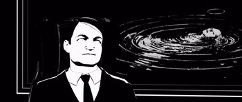 Movie still from “Renaissance” (2006), directed by Christian Volckman – A black and white image of a man in a suit and tie; Close Up shot, Low angle