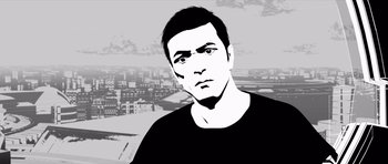 Movie still from “Renaissance” (2006), directed by Christian Volckman – Black and white image of a man in a black t - shirt; Close Up shot, Low angle