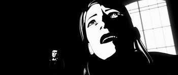 Movie still from “Renaissance” (2006), directed by Christian Volckman – A black and white photo of a woman's face; Close Up shot, Low angle