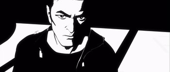 Movie still from “Renaissance” (2006), directed by Christian Volckman – A black and white image of a man's face; Close Up shot, Low angle