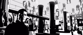 Movie still from “Renaissance” (2006), directed by Christian Volckman – A black and white photo of a man in front of a building; Wide shot, Low angle