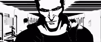 Movie still from “Renaissance” (2006), directed by Christian Volckman – A black and white image of a man's face; Close Up shot, Low angle