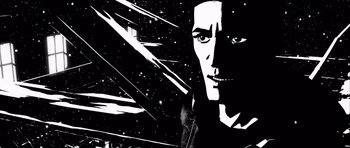 Movie still from “Renaissance” (2006), directed by Christian Volckman – A black and white image of a man's face; Close Up shot, Overhead angle