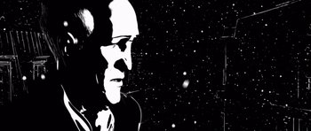 Movie still from “Renaissance” (2006), directed by Christian Volckman – A black - and - white photo of a man smoking a cigarette; Close Up shot, Low angle