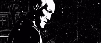 Movie still from “Renaissance” (2006), directed by Christian Volckman – A black and white image of a man with a bald head; Extreme Close Up shot, Low angle