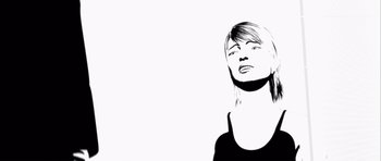 Movie still from “Renaissance” (2006), directed by Christian Volckman – A black and white image of a woman with her eyes wide open; Close Up shot, Low angle