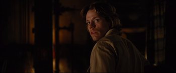 Movie still from “Rent” (2005), directed by Chris Columbus – A person with long hair; Close Up shot, Over the shoulder angle