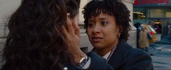 Movie still from “Rent” (2005), directed by Chris Columbus – A woman is looking at another woman's face; Close Up shot, Over the shoulder angle
