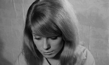 Movie still from “Repulsion” (1965), directed by Roman Polanski – A black and white photo of a woman with long hair; Close Up shot, Low angle