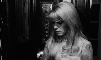 Movie still from “Repulsion” (1965), directed by Roman Polanski – A black - and - white photo of a woman with long blonde hair; Close Up shot, Low angle