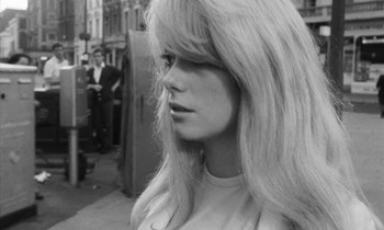 Movie still from “Repulsion” (1965), directed by Roman Polanski – A black and white photo of a woman with long blonde hair; Close Up shot, Over the shoulder angle