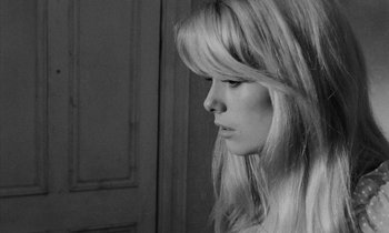 Movie still from “Repulsion” (1965), directed by Roman Polanski – A black - and - white photo of a woman with long blonde hair; Close Up shot, Low angle