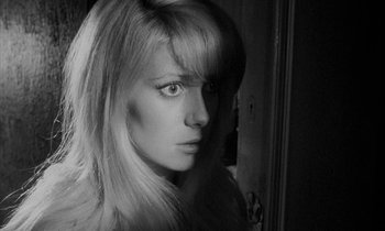 Movie still from “Repulsion” (1965), directed by Roman Polanski – A black and white photo of a woman with long hair; Close Up shot, High angle
