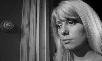 Movie still from “Repulsion” (1965), directed by Roman Polanski – A black - and - white photo of a woman with long hair; Close Up shot, Low angle