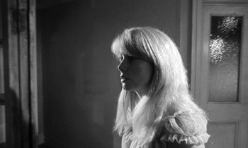 Movie still from “Repulsion” (1965), directed by Roman Polanski – A black and white photo of a woman with long blonde hair; Close Up shot, Low angle