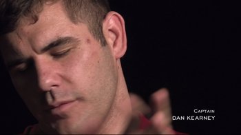 Movie still from “Restrepo” (2010), directed by Tim Hetherington – A man's face with his eyes closed; Extreme Close Up shot, Low angle