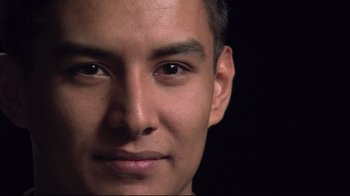 Movie still from “Restrepo” (2010), directed by Tim Hetherington – A young man's face; Close Up shot, Low angle