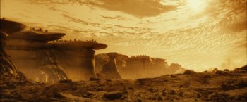 Movie still from “Riddick” (2013), directed by David Twohy – A view of a desert landscape from the ground; Extreme Wide shot, Low angle