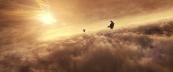 Movie still from “Riddick” (2013), directed by David Twohy – A group of people flying in the sky on a cloudy day; Extreme Wide shot, Overhead angle