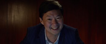 Movie still from “Ride Along 2” (2016), directed by Tim Story – A person wearing a suit; Close Up shot, High angle