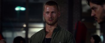 Movie still from “Ride Along 2” (2016), directed by Tim Story – A person wearing a jacket; Close Up shot, Over the shoulder angle