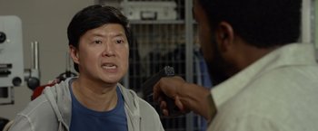 Movie still from “Ride Along 2” (2016), directed by Tim Story – A man holding a gun up to another man's face; Close Up shot, Over the shoulder angle