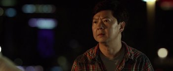 Movie still from “Ride Along 2” (2016), directed by Tim Story – A person wearing a plaid shirt; Close Up shot, Over the shoulder angle