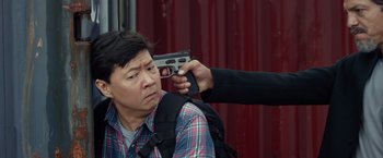 Movie still from “Ride Along 2” (2016), directed by Tim Story – A man holding a gun up to his head; Close Up shot, Over the shoulder angle