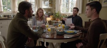 Movie still from “13 Reasons Why” (2017), created by Brian Yorkey – A group of people sitting around a table eating breakfast; Medium shot, Over the shoulder angle